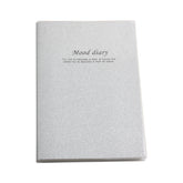 Glitter Note Pad(18K/17.5*24.2CM) featuring a shimmering silver cover with a motivational quote.
